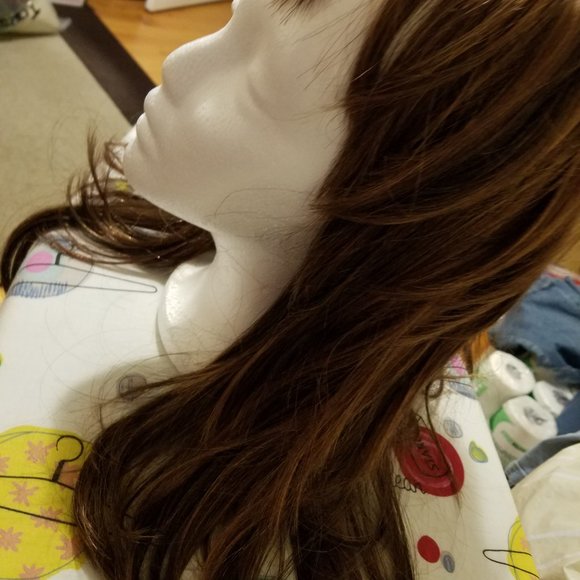 A modern edgy shag style is long and luscious with full choppy layers and bangs. main image 4